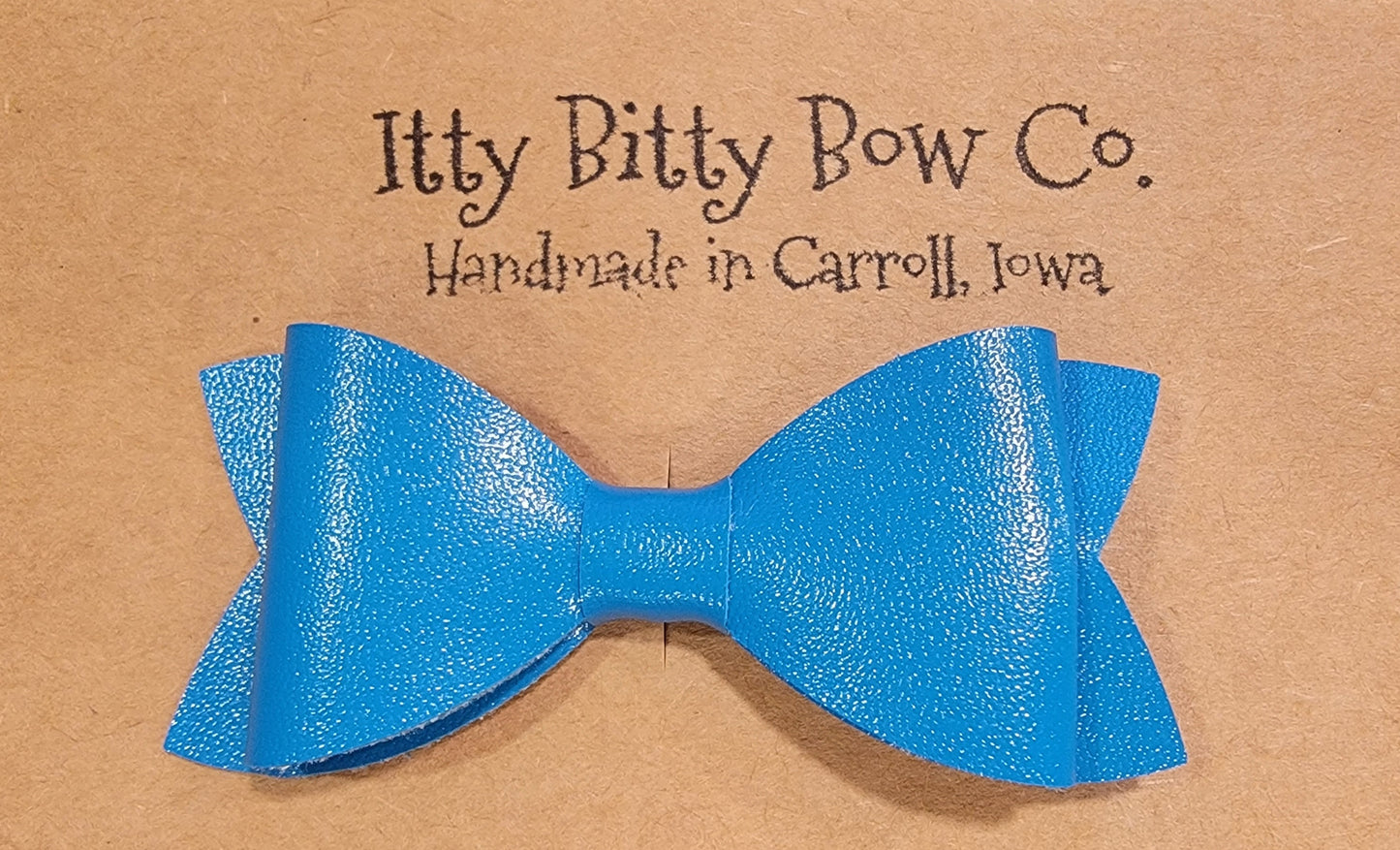 Solid Sapphire Leather Bow Clip