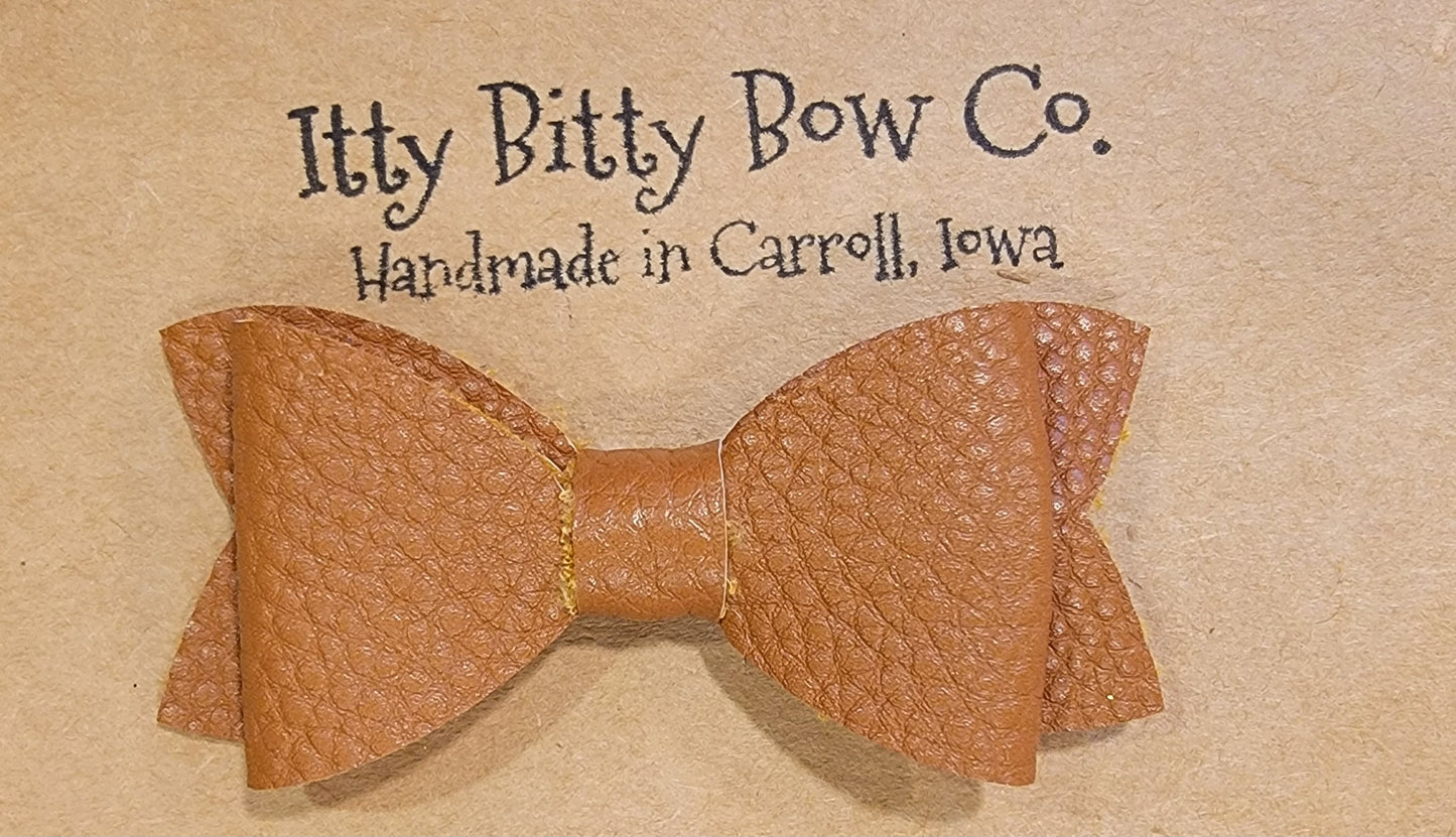 Solid Tarzan Tan Leather Bow Clip