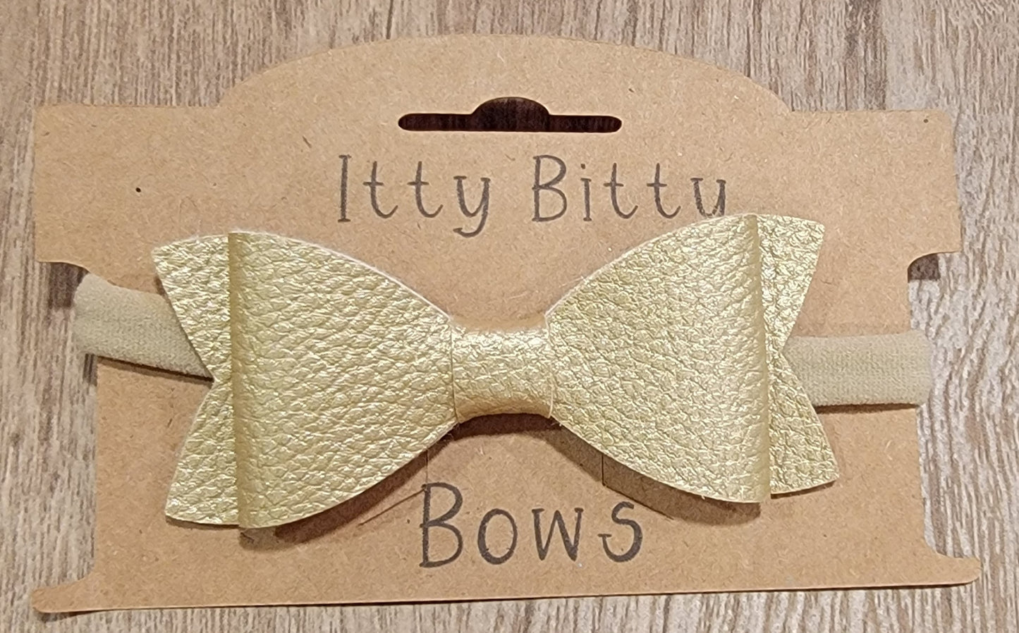 Gold Pebbled Leather Nylon Bow